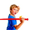 Young boy in studio playing with sword on white background